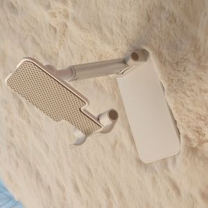 White sturdy adjustable and collapsible phone holders